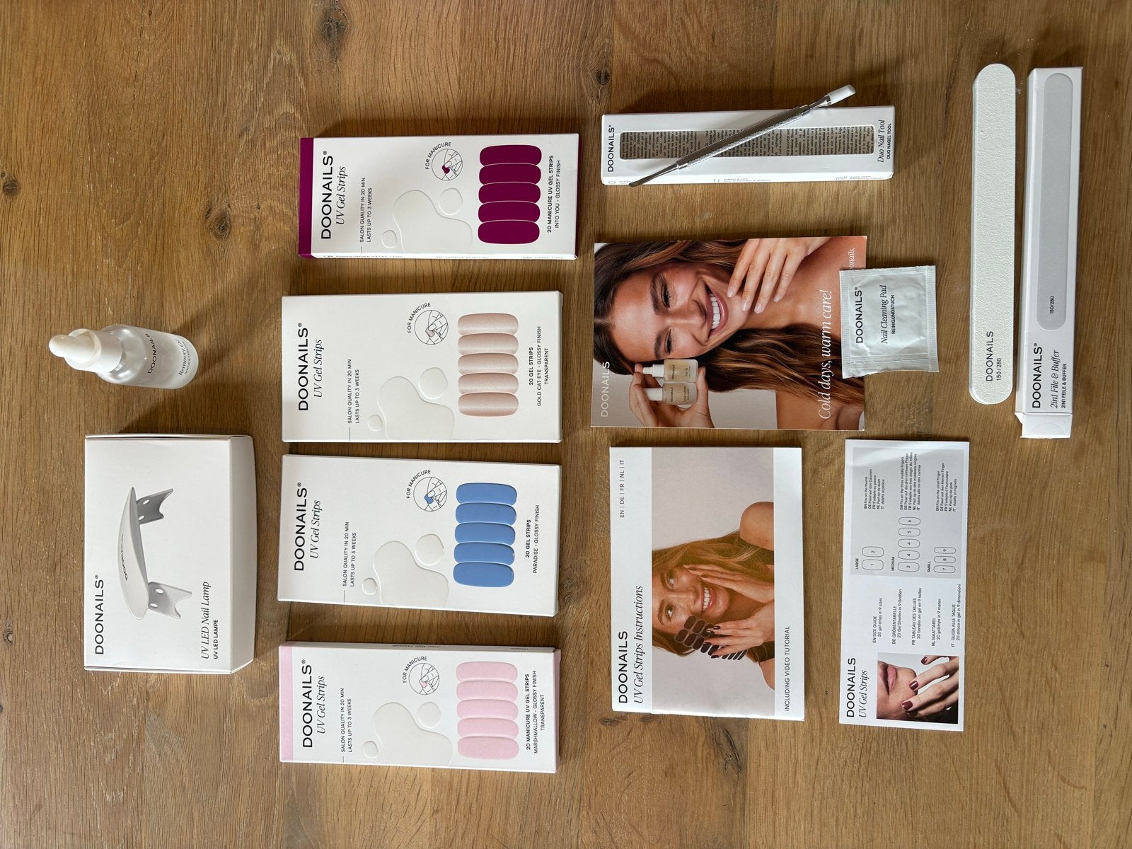 Doonails nagelstrips / gelstrips complete set incl UV lamp, Ophalen of Verzenden, Zo goed als nieuw, Roze, Handen en Nagels