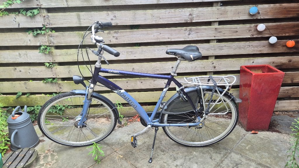 Blauwe herenfiets, Fietsen en Brommers, Fietsen | Heren | Herenfietsen, Gebruikt, Versnellingen, 57 tot 61 cm, Trommelrem