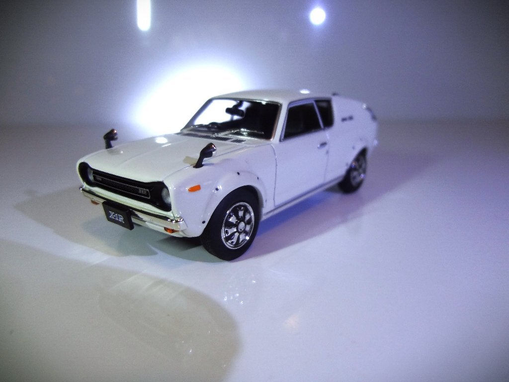 Datsun 100 A Coupe Cherry jaar 1973 Almost real Japan, Verzenden, Zo goed als nieuw, Auto, Overige merken