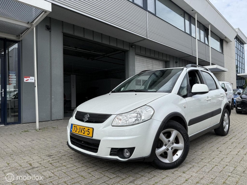 Suzuki SX4 1.6 Exclusive Parelmoer wit 1 jaar APK, 15 km/l, Gebruikt, 4 cilinders, Automatische klimaatregeling