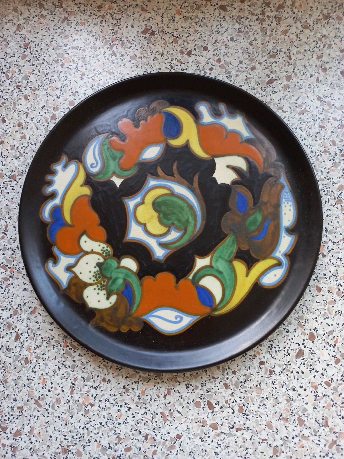 plateel bord, Ophalen