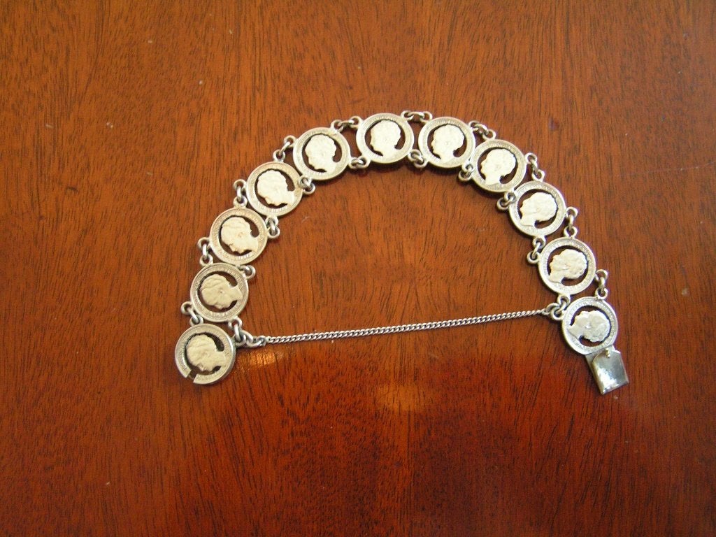 zilveren gezaagde dubbeltjes armband, Sieraden, Tassen en Uiterlijk, Armbanden, Ophalen, Zo goed als nieuw, Zilver, Zilver