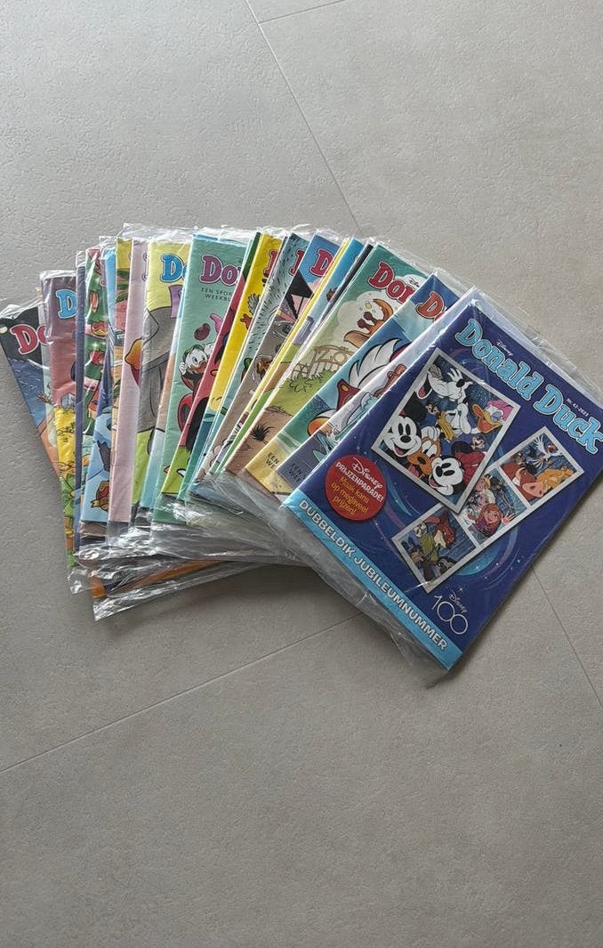 Donald Duck 25 stuks nieuw in plastic, Boeken, Strips | Comics, Europa, Nieuw, Ophalen of Verzenden, Meerdere comics