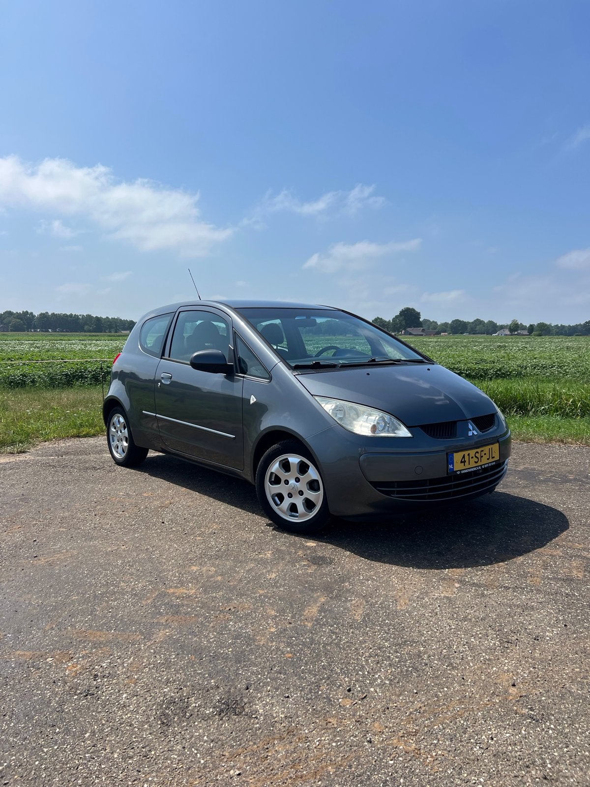 Mitsubishi Colt 1.3 Mivec CZ3 2005 Grijs, Auto's, Mitsubishi, Voorwielaandrijving, Stof, Colt, Origineel Nederlands