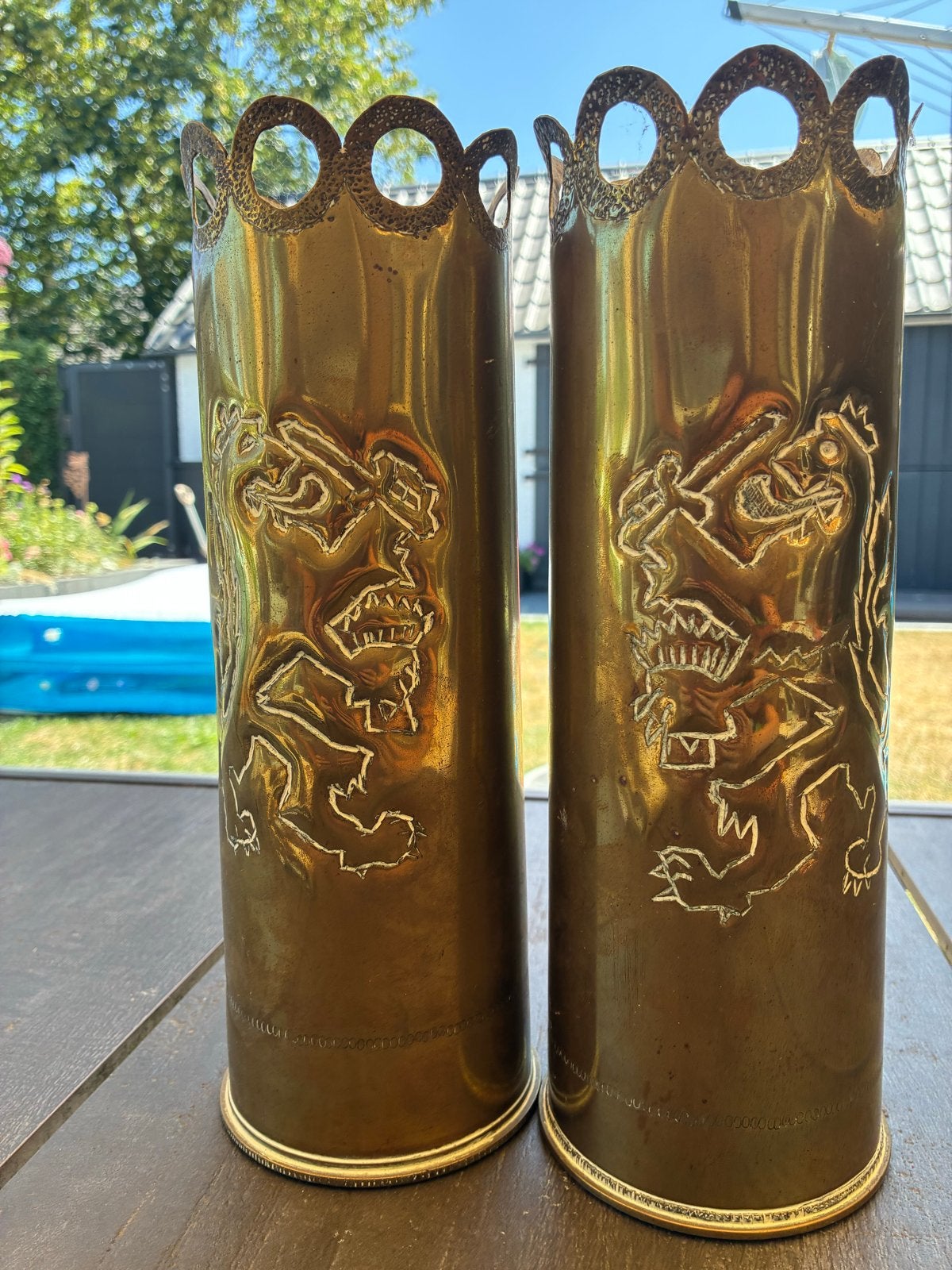 Decoratieve messing granaathulzen met leeuwenreliëf, Ophalen of Verzenden