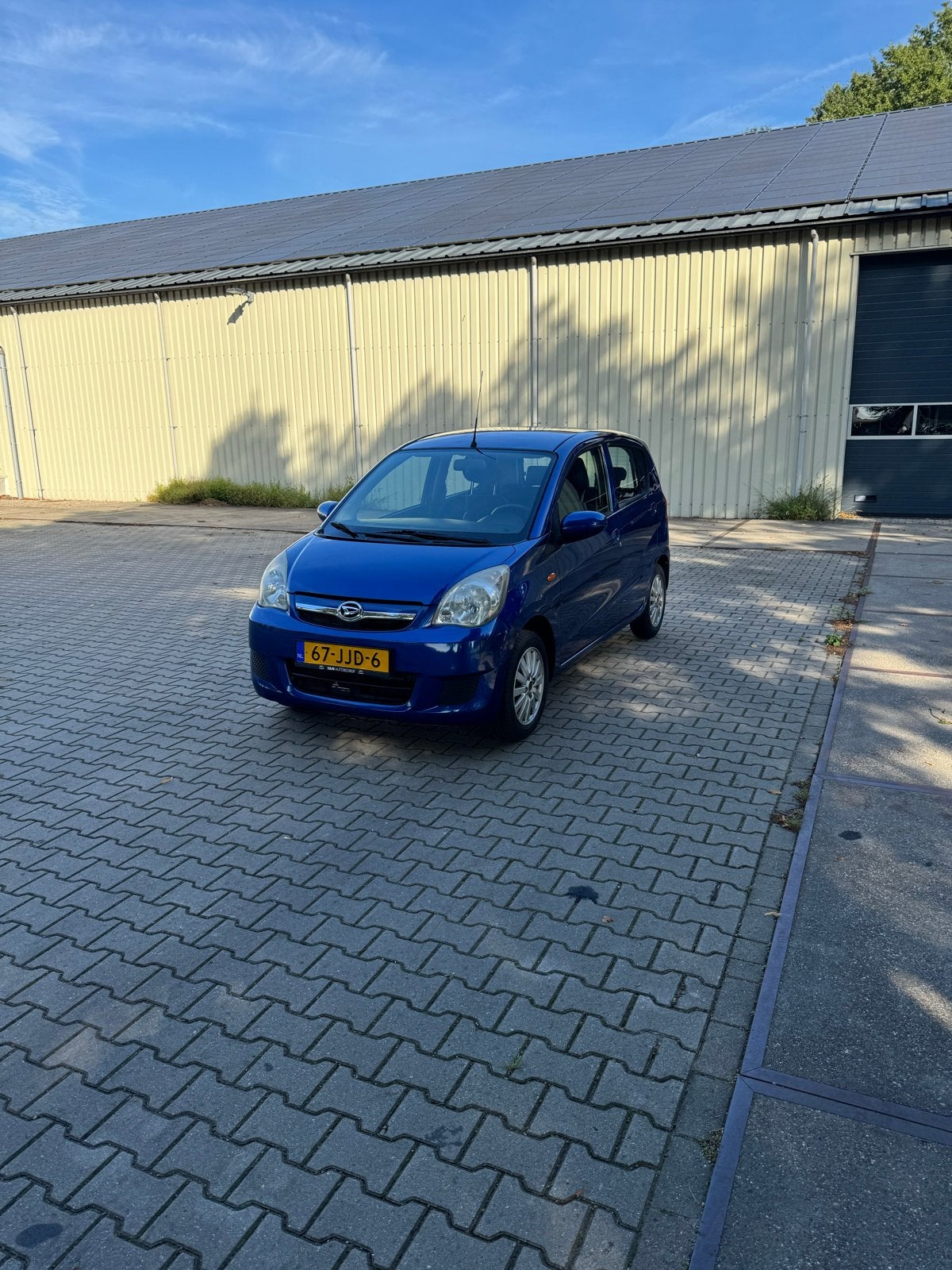 Daihatsu Cuore 1.0 5D 2009 Blauw, Auto's, Voorwielaandrijving, Euro 5, Stof, 600 kg