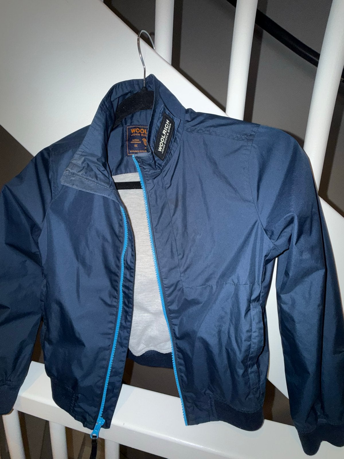 Woolrich. Kinderjas - Donkerblauw, Ophalen of Verzenden, Zo goed als nieuw, Jongen