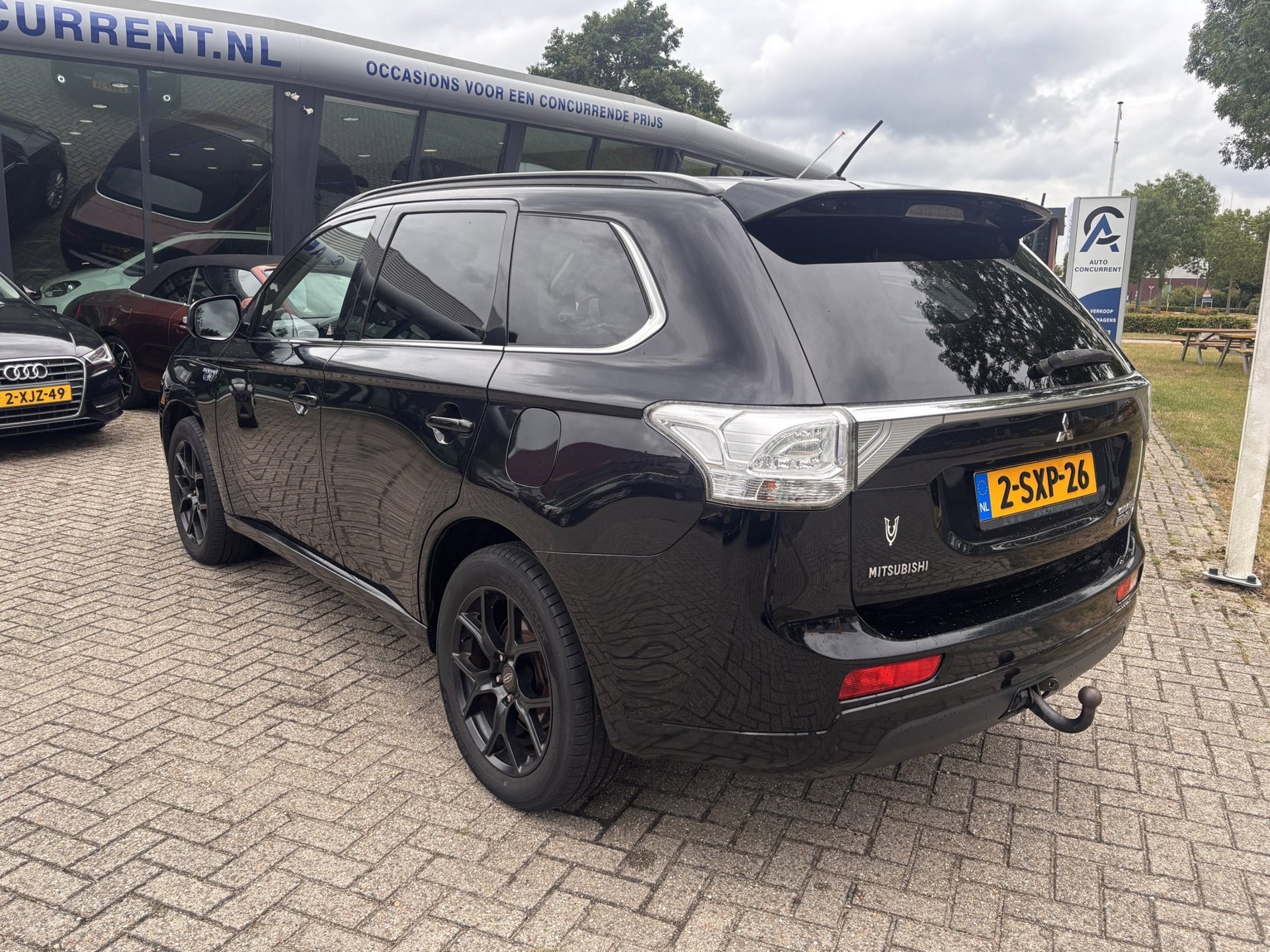 Mitsubishi Outlander 2.0 PHEV Instyle, Carplay, Leder, Dakje, Auto's, Mitsubishi, Stoelverwarming, 4 cilinders, Zwart, Vierwielaandrijving