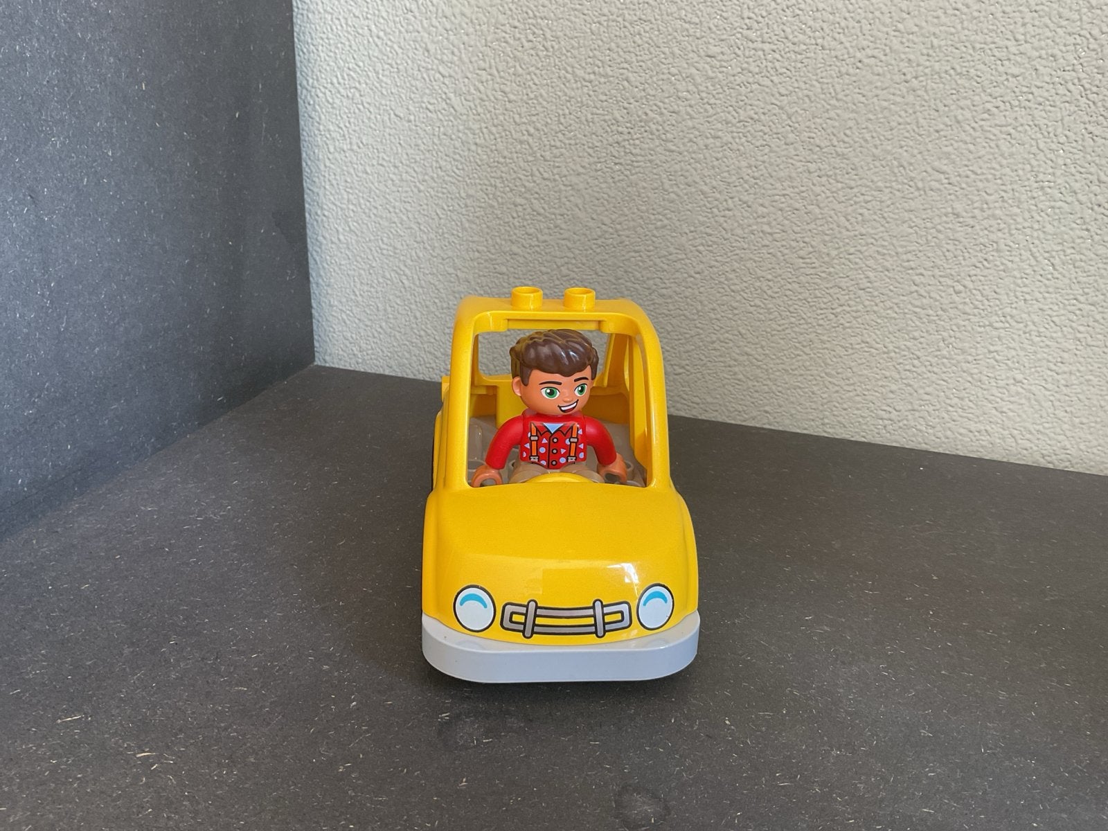 Gele Duplo auto met figuur, Ophalen of Verzenden, Gebruikt