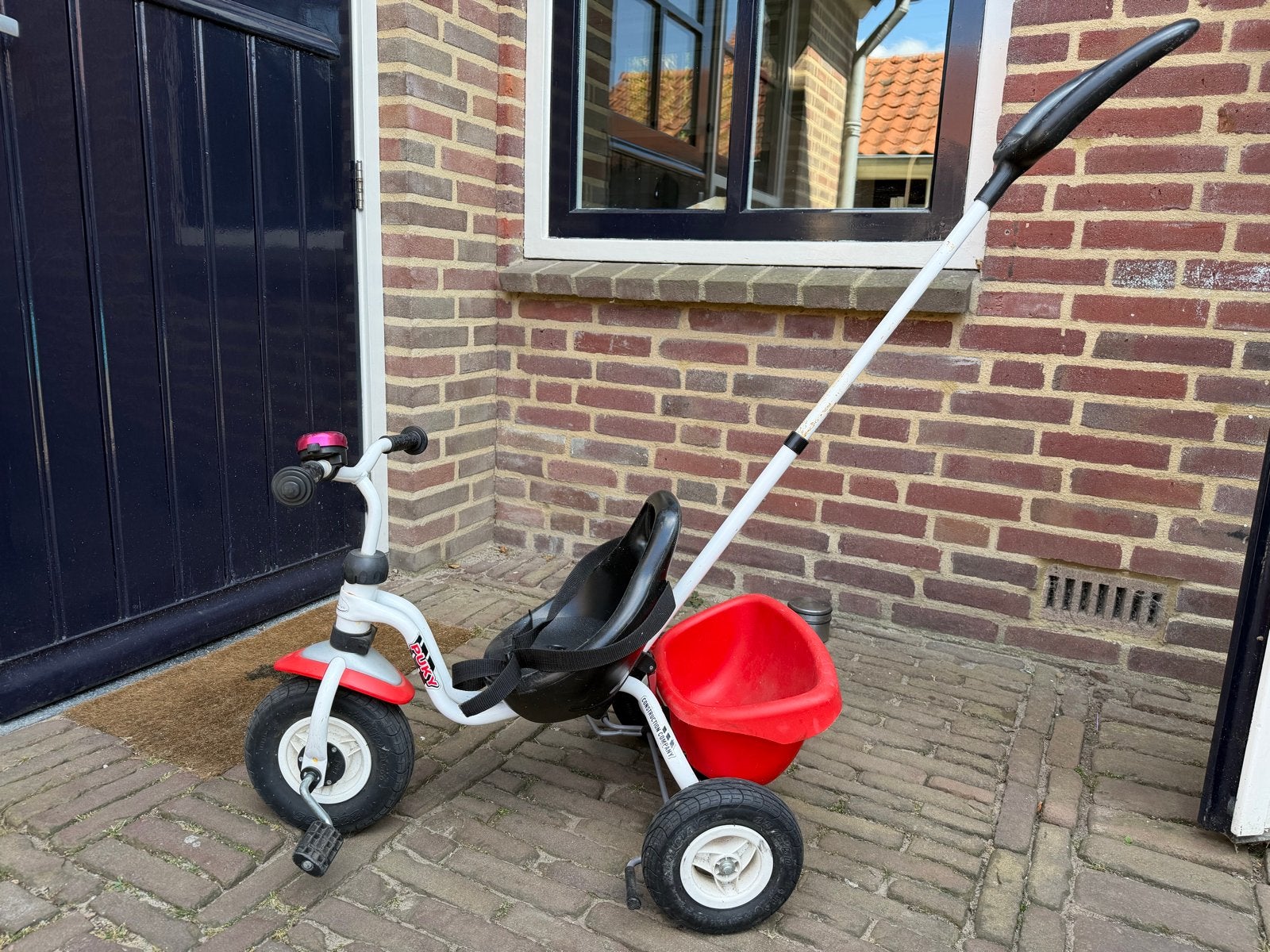 Puky driewieler met duwstang en kiepbakje, Ophalen, Gebruikt, Terugtraprem, Duwstang