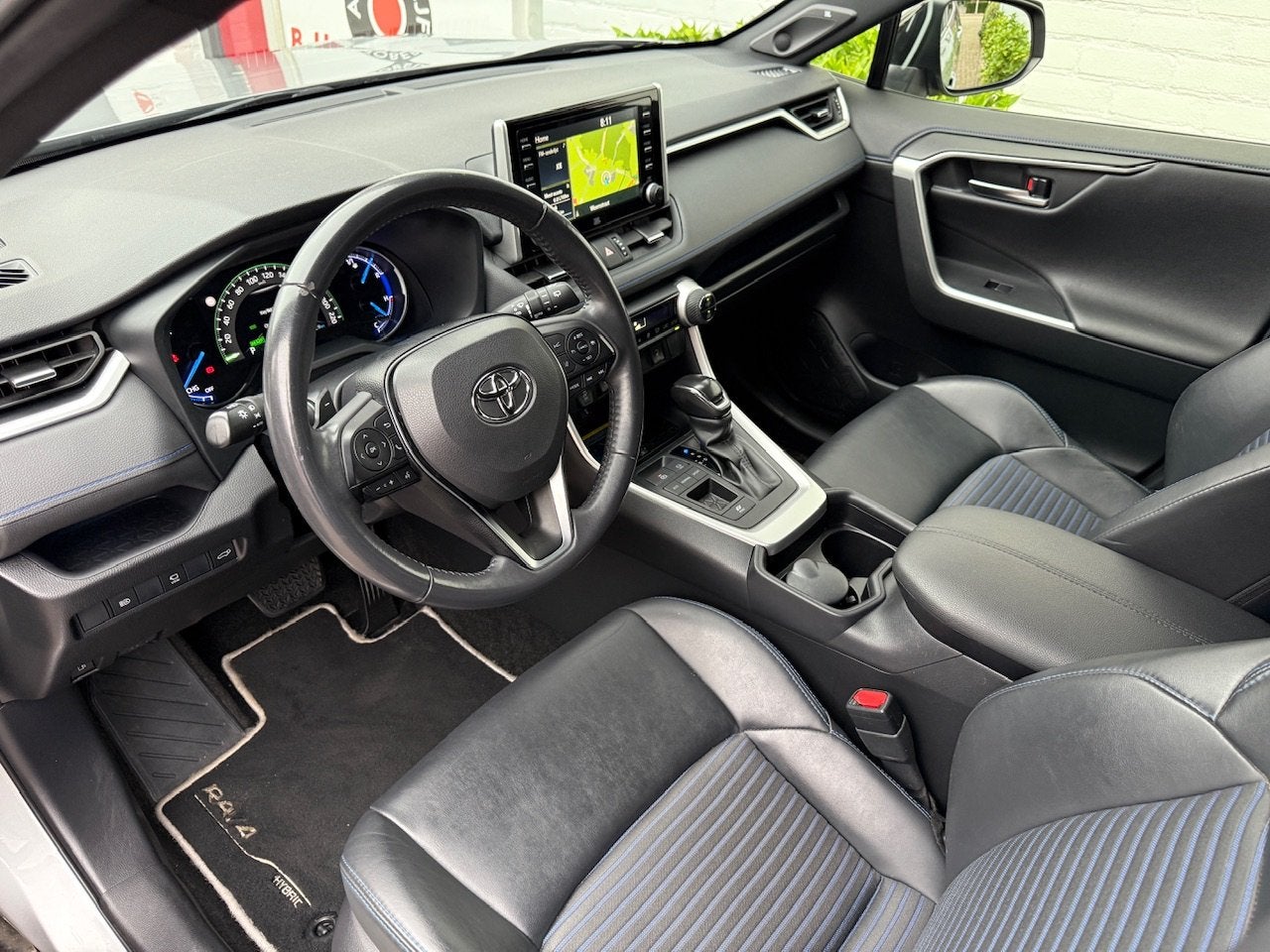 Toyota RAV4 2.5 Hybrid 218pk CVT Bi-Tone/ Alarm klasse 3/ Af, Gebruikt, 4 cilinders, 2487 cc, Leder en Stof
