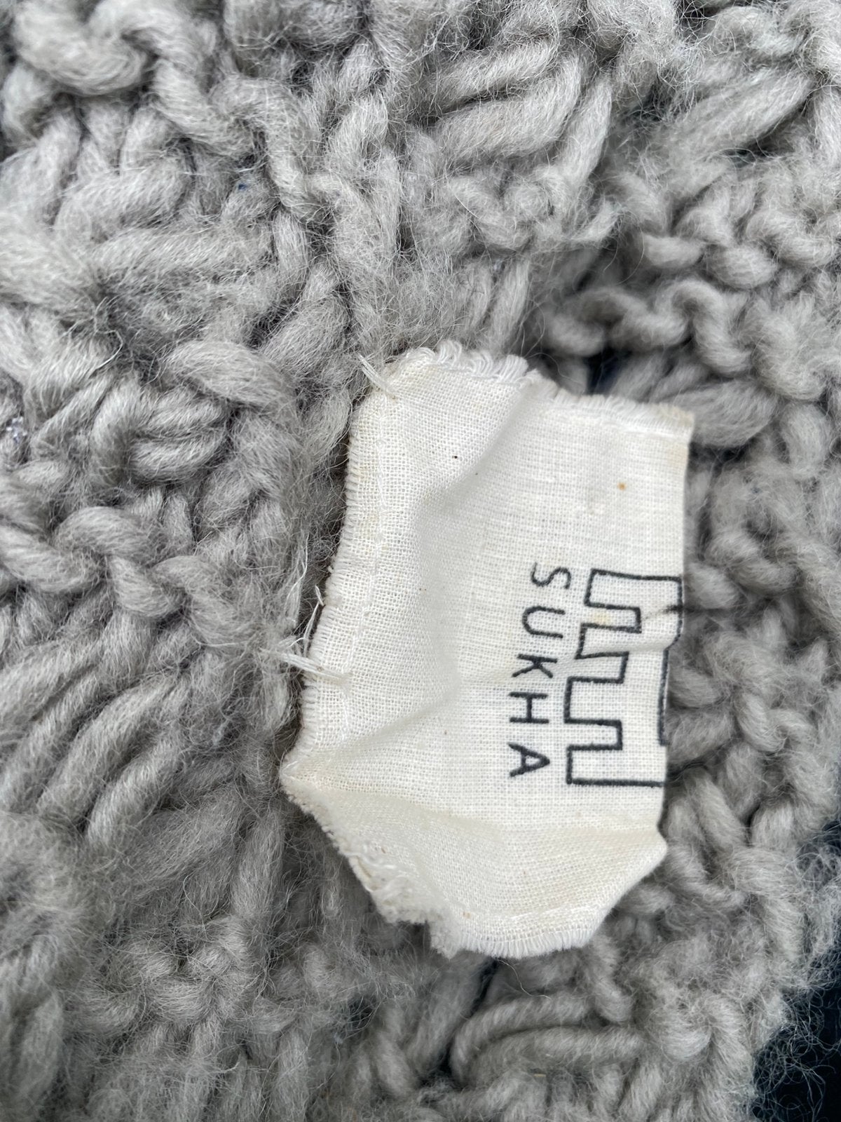 Sukha gebreid wollen kleed, Huis en Inrichting, 100 tot 150 cm, Verzenden, 200 cm of meer, Zo goed als nieuw