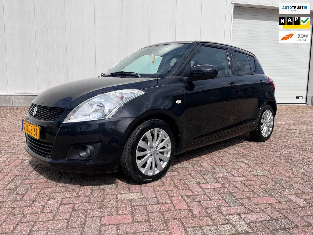 Suzuki Swift 1.2 Exclusive EASSS stoelverwarming airco navig, Voorwielaandrijving, Gebruikt, 4 cilinders, 400 kg