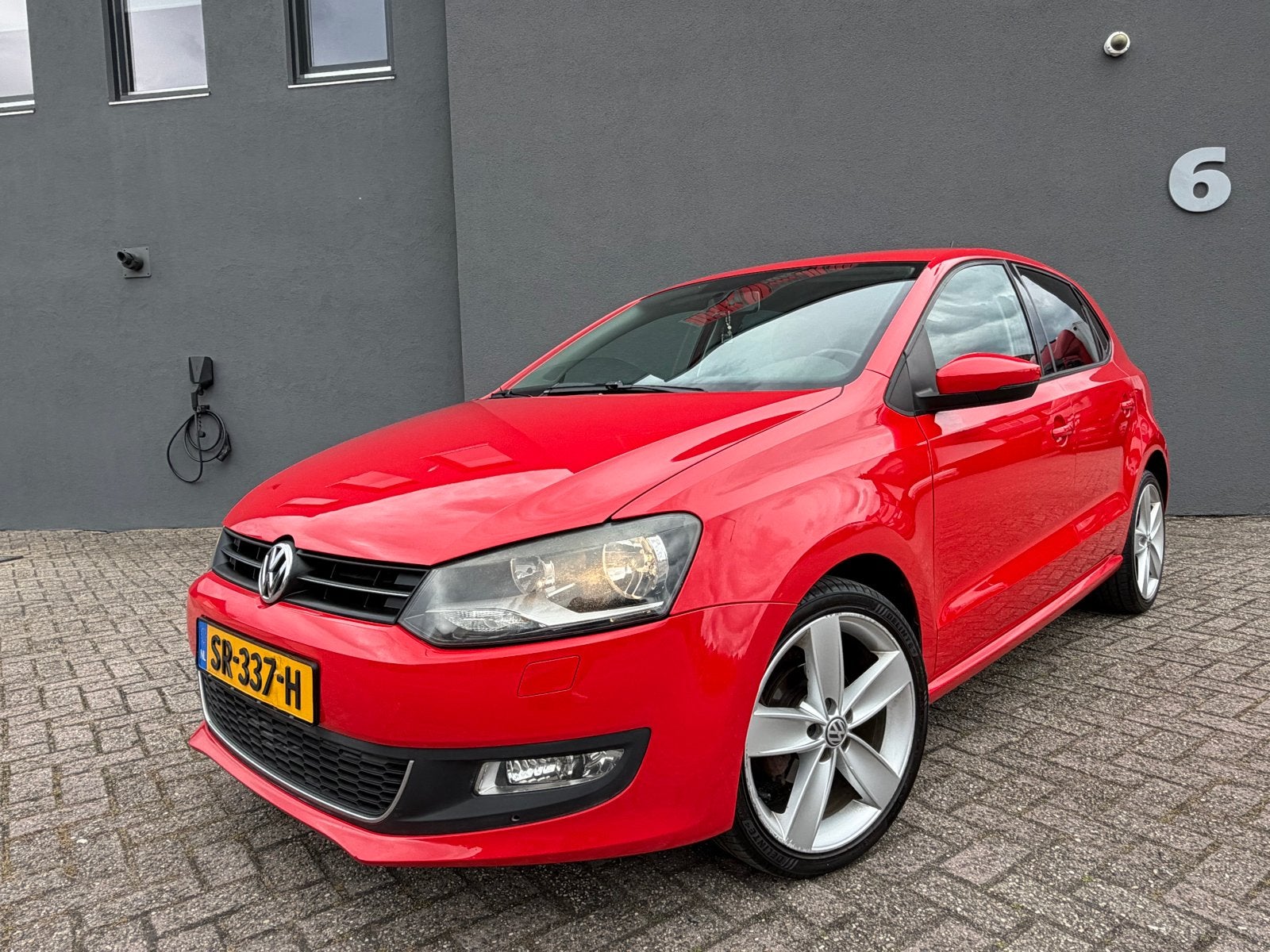 Volkswagen Polo 1.4 16V FSI 63KW 2009 Rood, Auto's, Volkswagen, Bedrijf, Polo, Airbags, Airconditioning, Bluetooth, Centrale vergrendeling