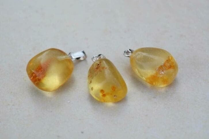 Amber hangers (01), Ophalen of Verzenden, Mineraal