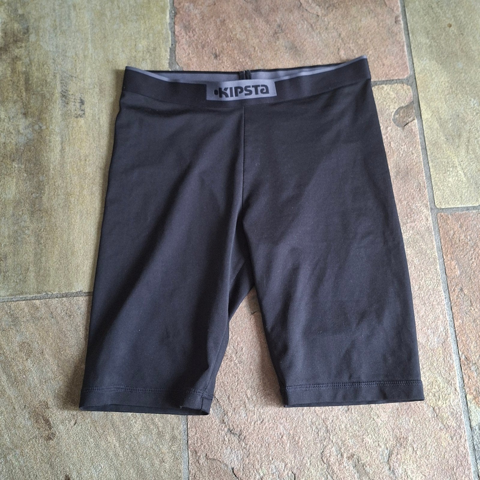 Zwarte slidingbroek voetbal - Kipsta - Maat 164, Maat XS of kleiner, Ophalen of Verzenden, Zo goed als nieuw, Broek