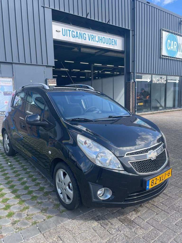 Chevrolet Spark 1.0 Bifuel 2012 Zwart, Auto's, Chevrolet, 15 km/l, 37 €/maand, 4 cilinders, Zwart