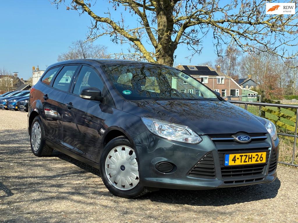 Ford Focus Wagon 1.6 TDCI Lease Trend | Cruise + Airco + Nav, Euro 5, Stof, Gebruikt, Zwart