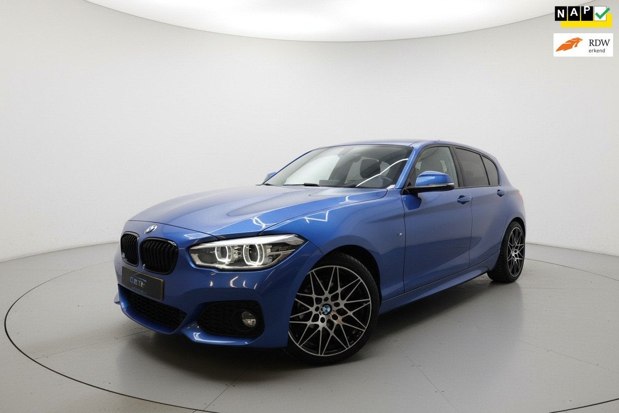 BMW 1-serie 118i High Executive M PAKKET LEER PDC NACI NAP, Auto's, Gebruikt, Blauw, Bedrijf, 650 kg