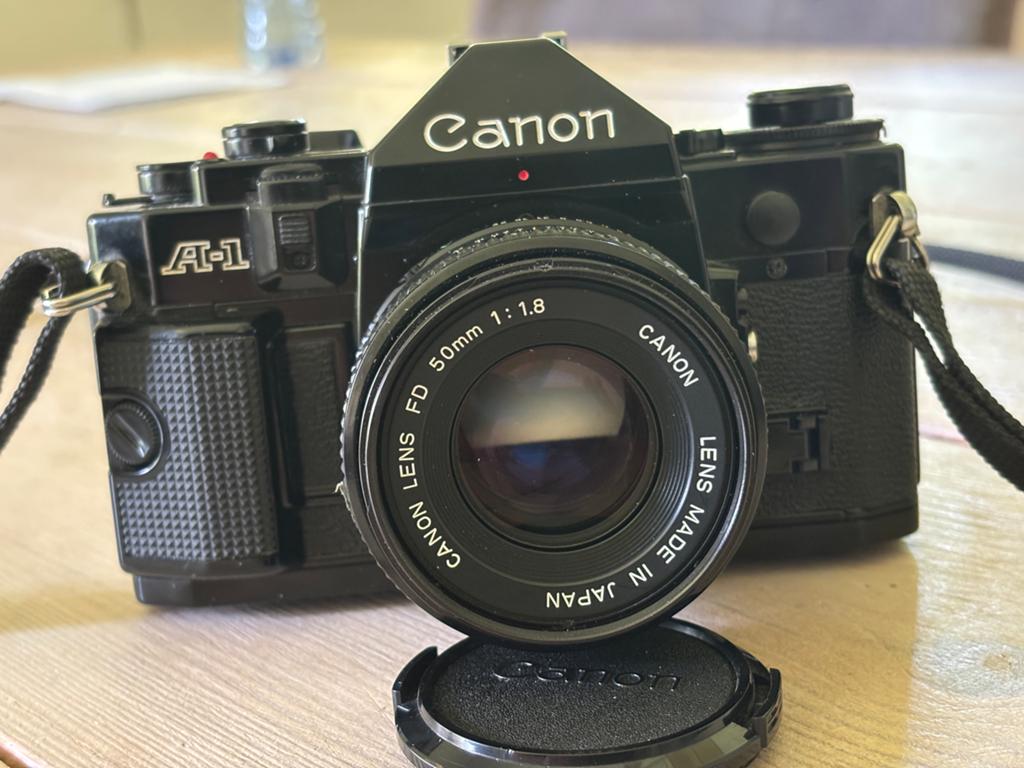 Canon A-1 Spiegelreflexcamera met FD 50mm 1:1.8 lens, Audio, Tv en Foto, Fotocamera's Analoog, Ophalen of Verzenden, Gebruikt