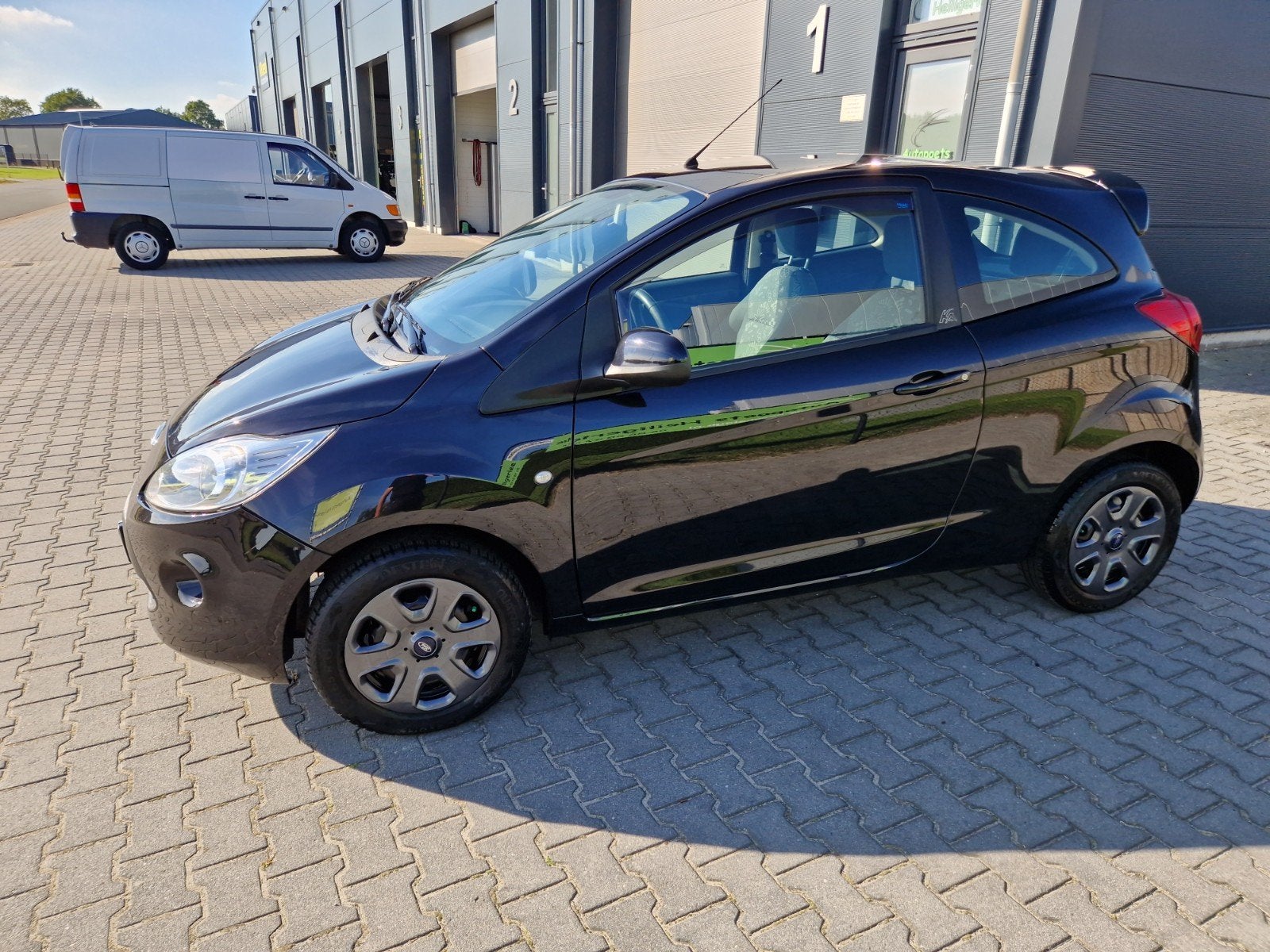 Ford Ka 1.2 51KW 2009 Zwart, Auto's, Voorwielaandrijving, Stof, 1242 cc, 4 cilinders