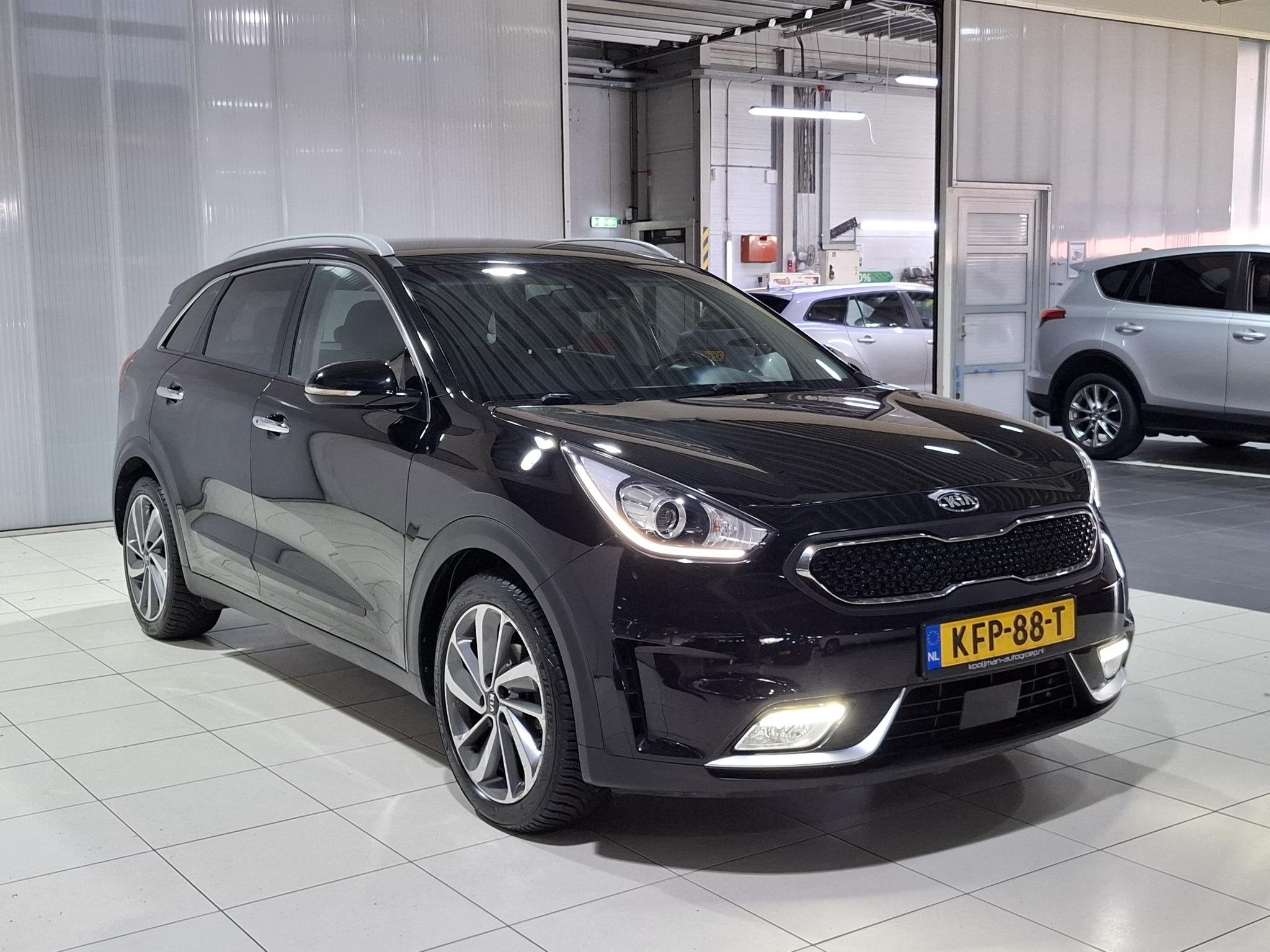 Kia Niro 1.6 GDi Hybrid DynamicLine 18 Inch, Apple Carplay/A, Auto's, Kia, Gebruikt, Euro 6, 2 kWh, Leder en Stof