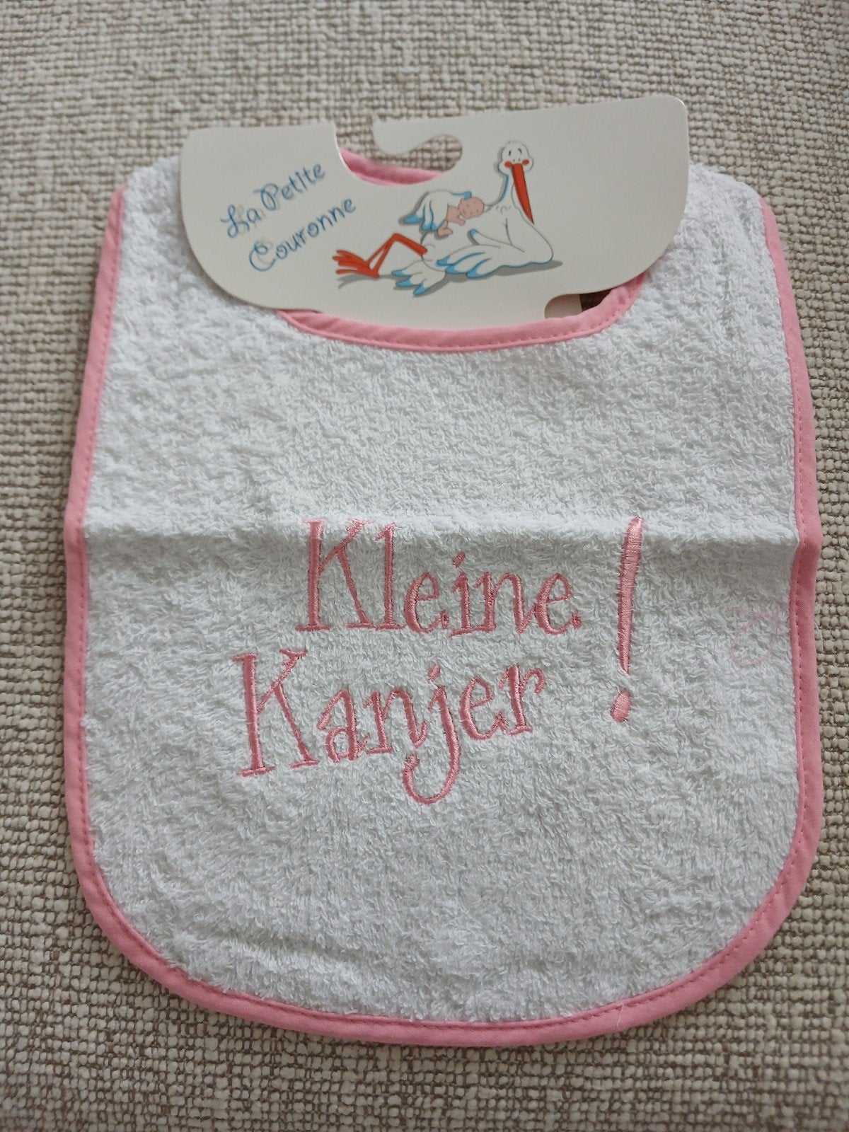 Nieuw slabbetje 'Kleine Kanjer' met roze rand, Kinderen en Baby's, Ophalen of Verzenden