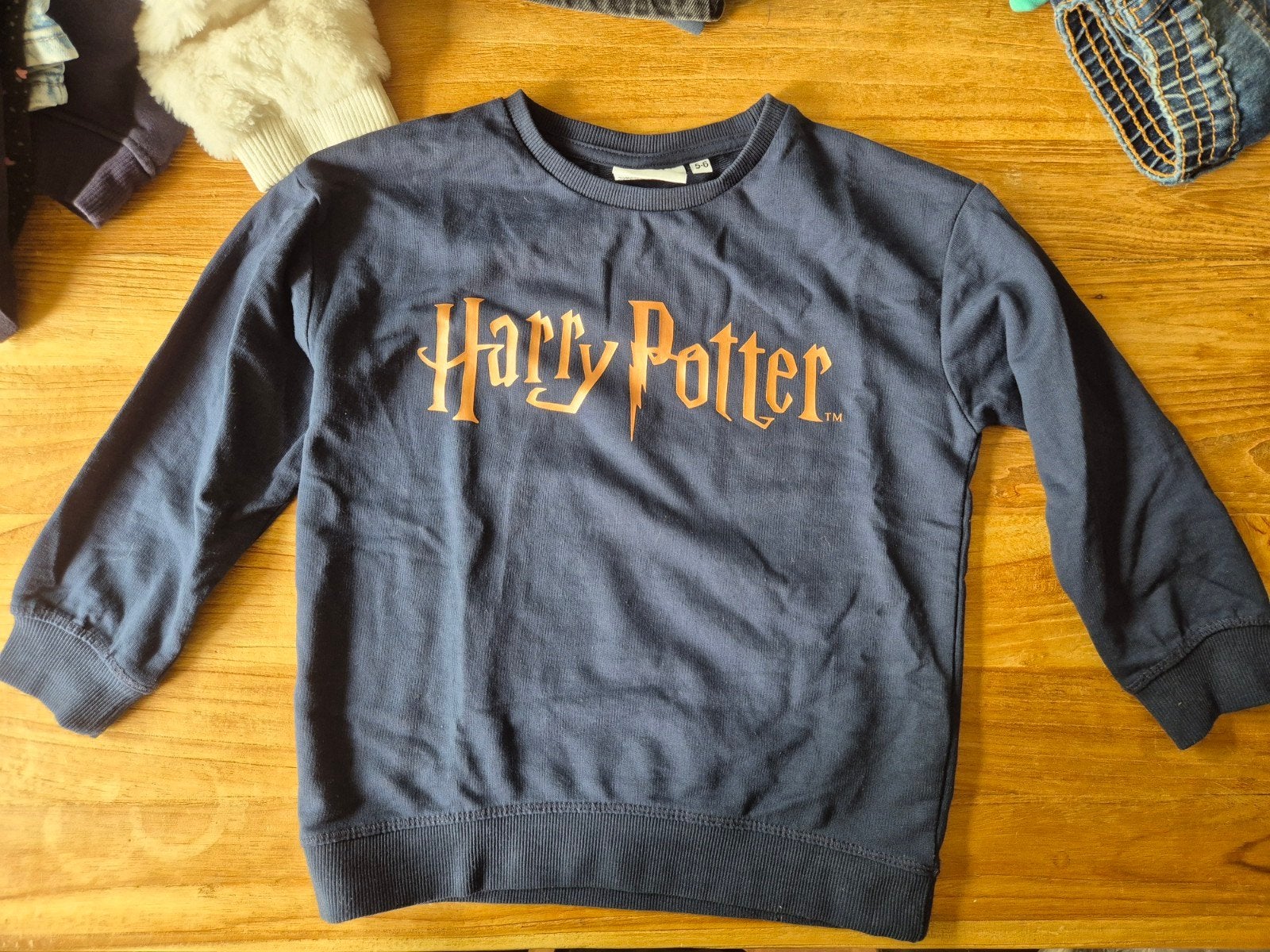 Donkerblauwe trui Harry Potter 5-6 jaar zgan, Kinderen en Baby's, Ophalen, Zo goed als nieuw, Jongen of Meisje, Trui of Vest