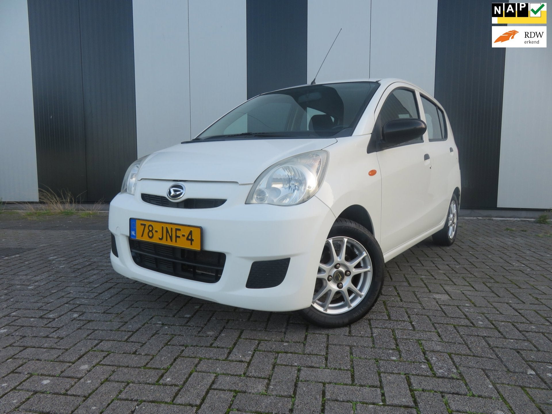 Daihatsu Cuore 1.0 Comfort, Auto's, Voorwielaandrijving, Dealer onderhouden, Stof, Zwart