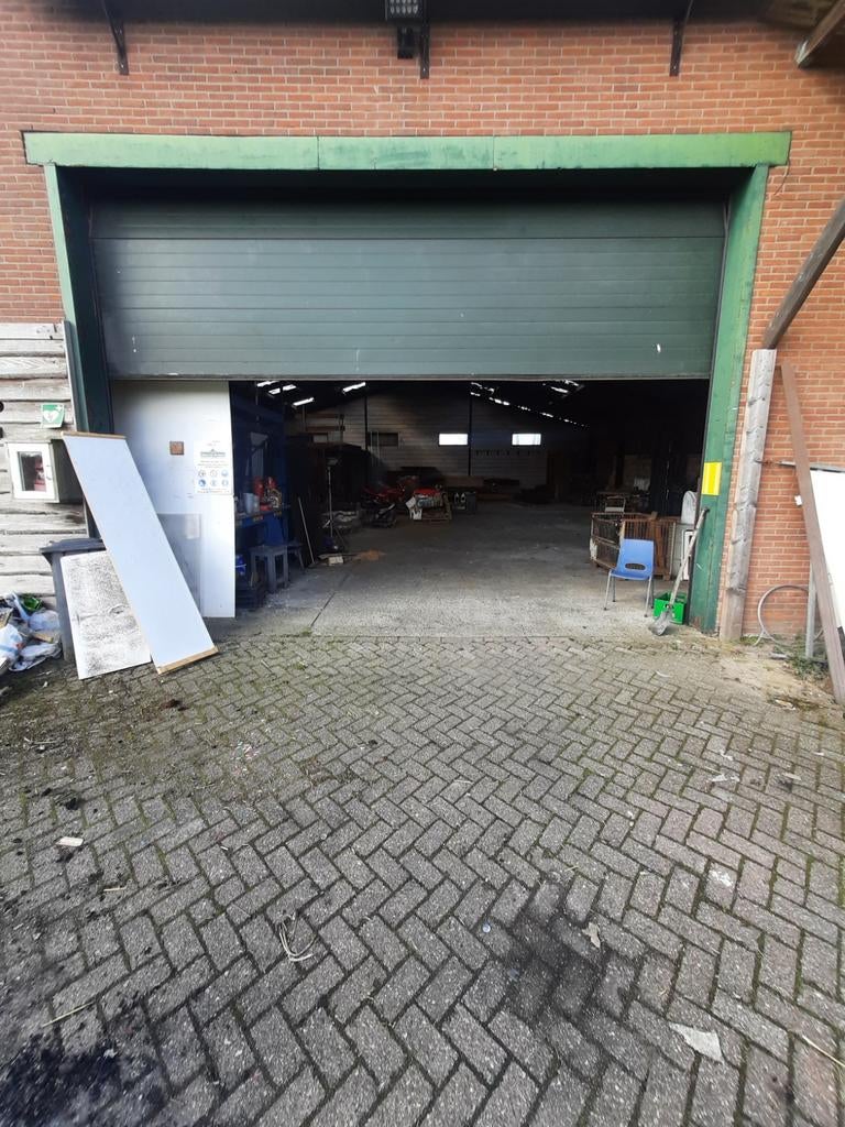 2 donkergroene handbediende sectionaaldeuren, Ophalen of Verzenden