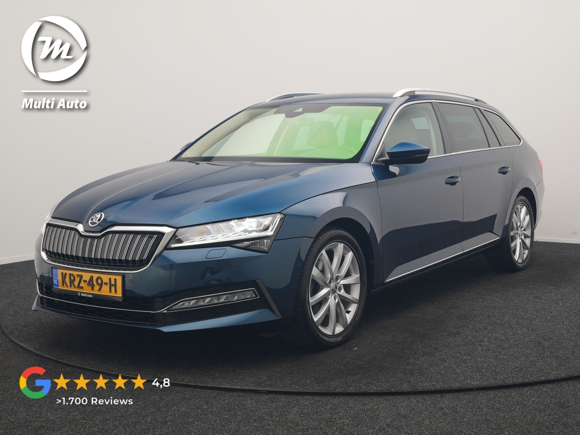Skoda Superb Combi 1.4 TSI iV Laurin & Klement PHEV 218pk De, Auto's, Skoda, Gebruikt, Beige, 4 cilinders, Blauw