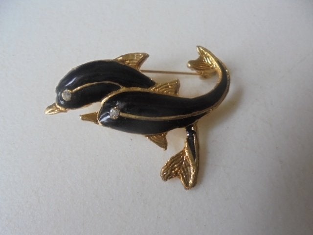 Broche dolfijnen zwart/goud, Ophalen of Verzenden, Zo goed als nieuw, Zwart, Overige materialen