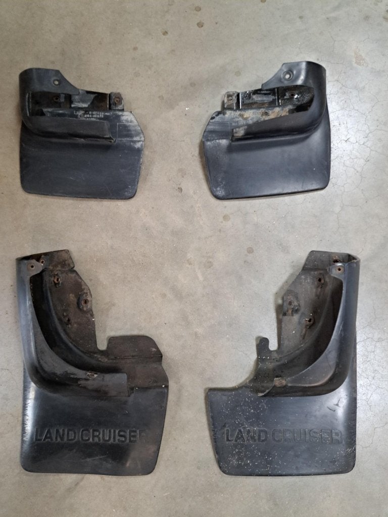 Set gebruikte spatlappen Toyota Landcruiser 80 HDJ80 FZJ HZJ, Gebruikt, Voor, Ophalen of Verzenden, Spatbord