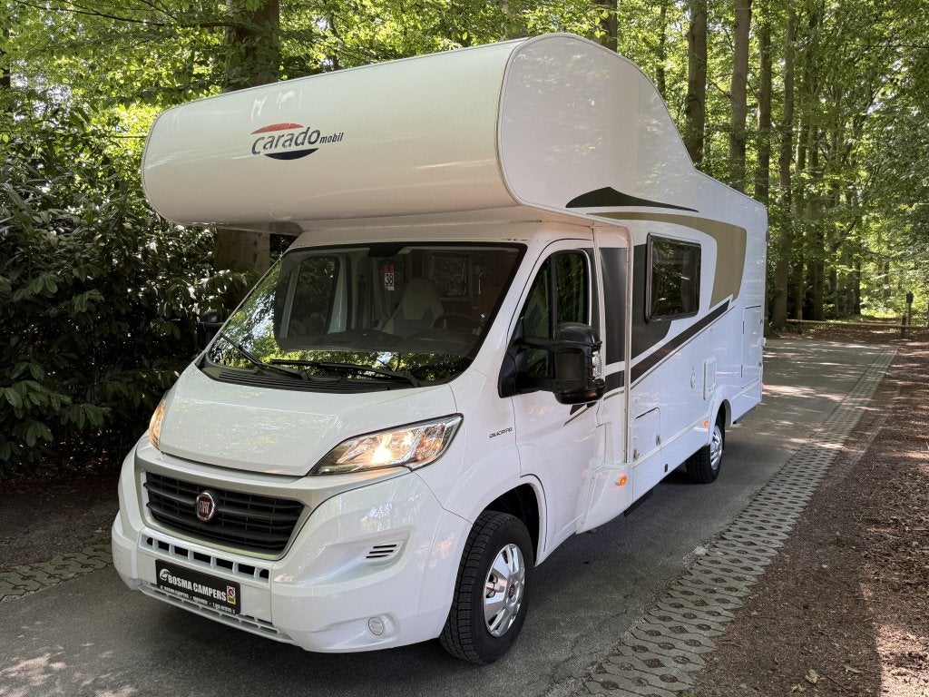 Carado A 700 Alkoof 77000 km Airco Levelsysteem 6 persoons, Caravans en Kamperen, Campers, Standaard zit, Alkoof, Ringverwarming