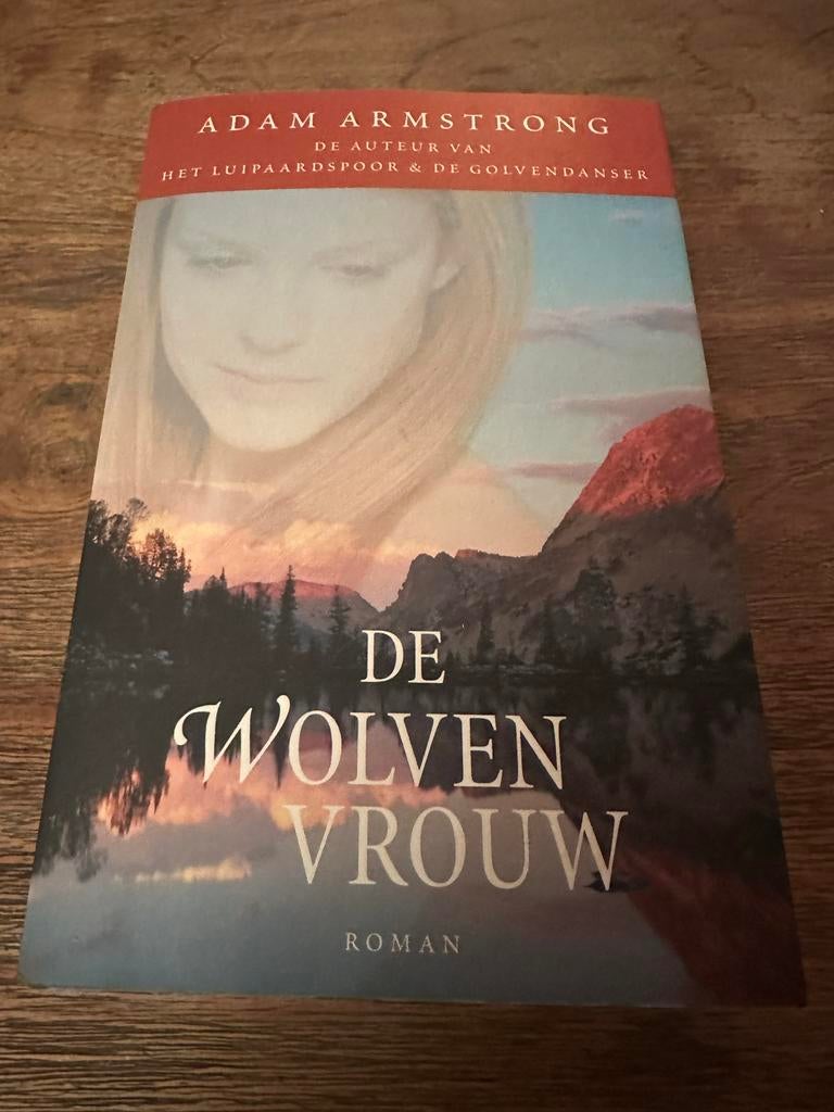 De Wolvenvrouw - Adam Armstrong (Roman), Boeken, Ophalen of Verzenden, Zo goed als nieuw