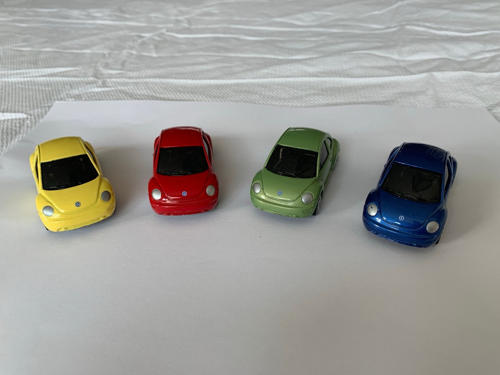 Maisto VW Beetle speelgoedauto's - set van 4, Ophalen of Verzenden, Gebruikt, Auto