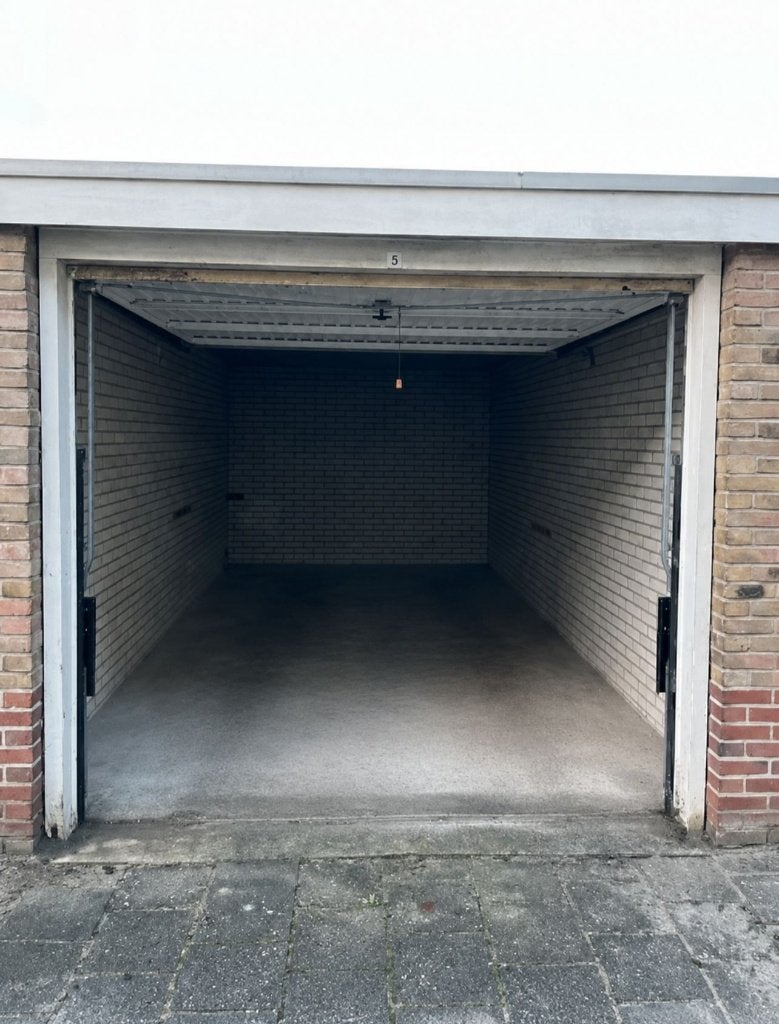 Te huur garagebox Groningen-Zuid (Henri Dunantlaan) 16,5 M2, Ophalen