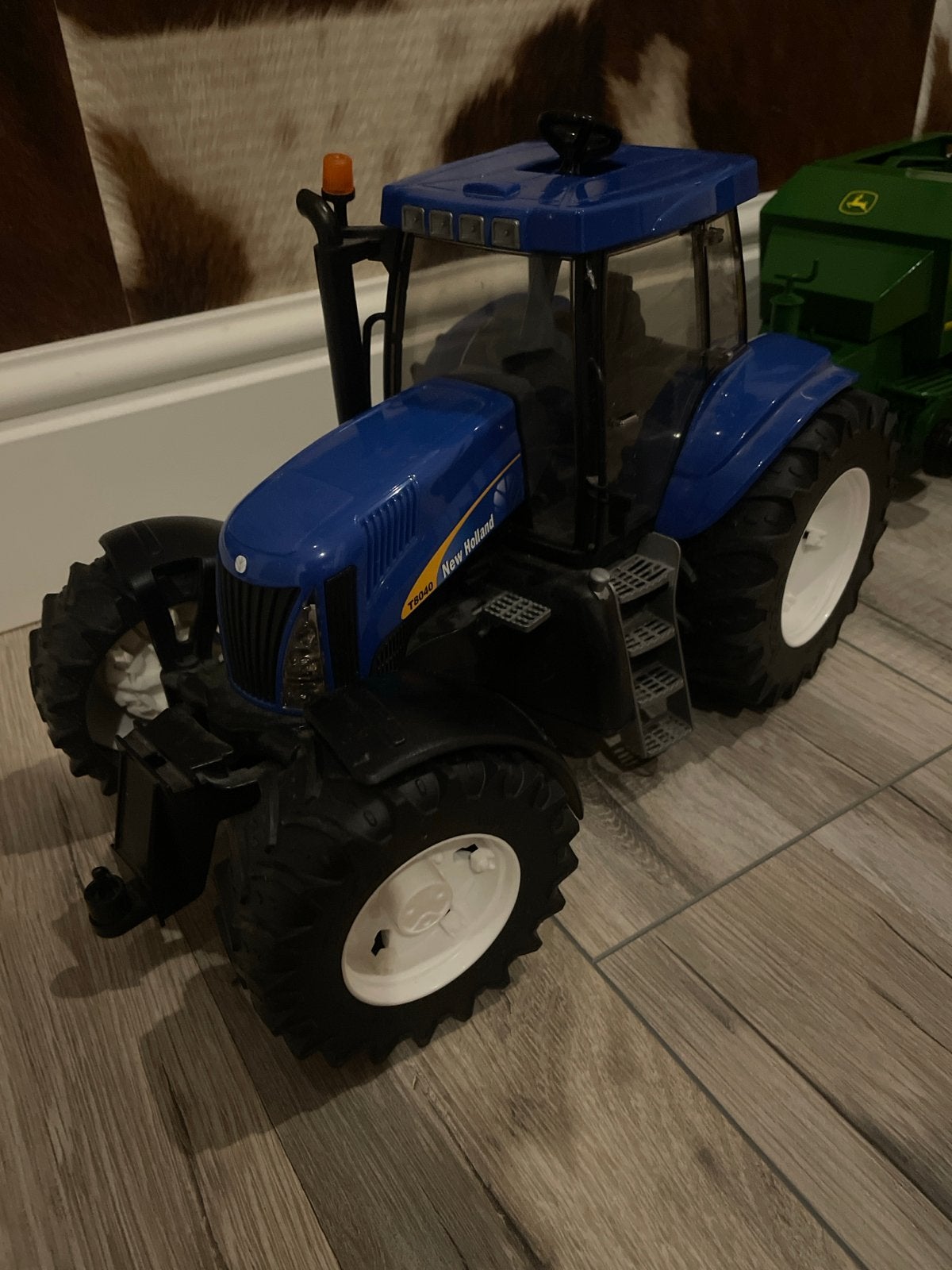 New holland trekker met john deere balenpers, Ophalen of Verzenden, Gebruikt