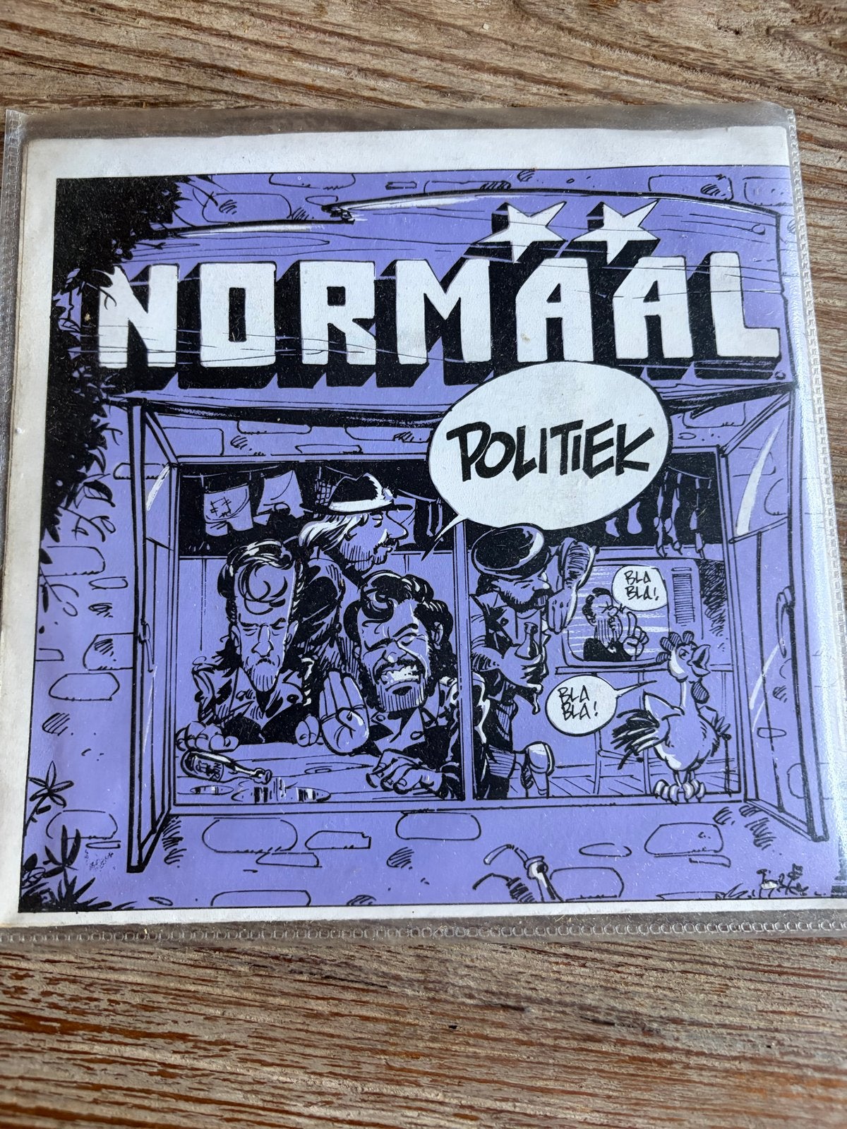 Normaal - Politiek 7" single met stripboek (1984), Ophalen of Verzenden, Zo goed als nieuw