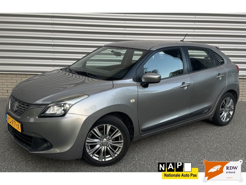 Suzuki Baleno 1.2 Exclusive Xenon Navi Stoelverw Nwe APK, Auto's, Gebruikt, 4 cilinders, 840 kg, Origineel Nederlands
