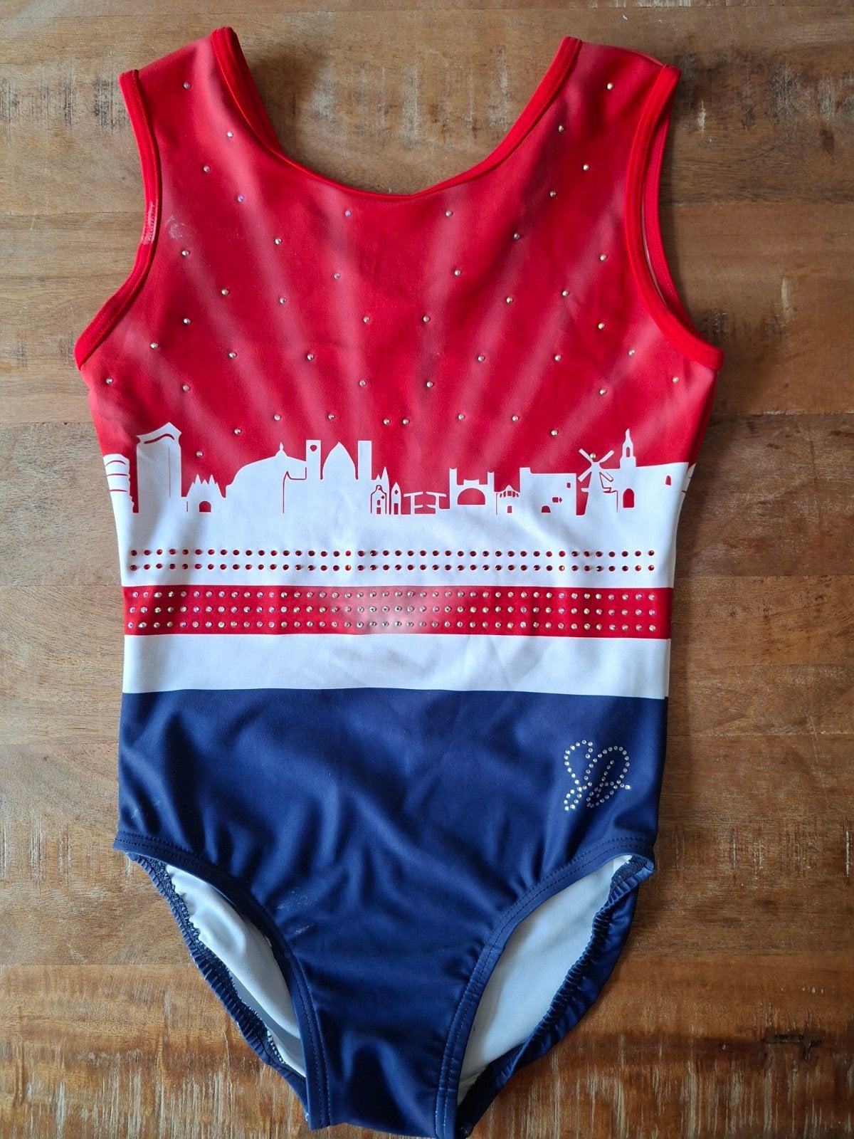 Turnteam Haarlem pakje Maat CLA (ca. 8-10 jaar / 134/140), Blauw, Zo goed als nieuw, Turnpak(je), Kindermaat 122 t/m 140