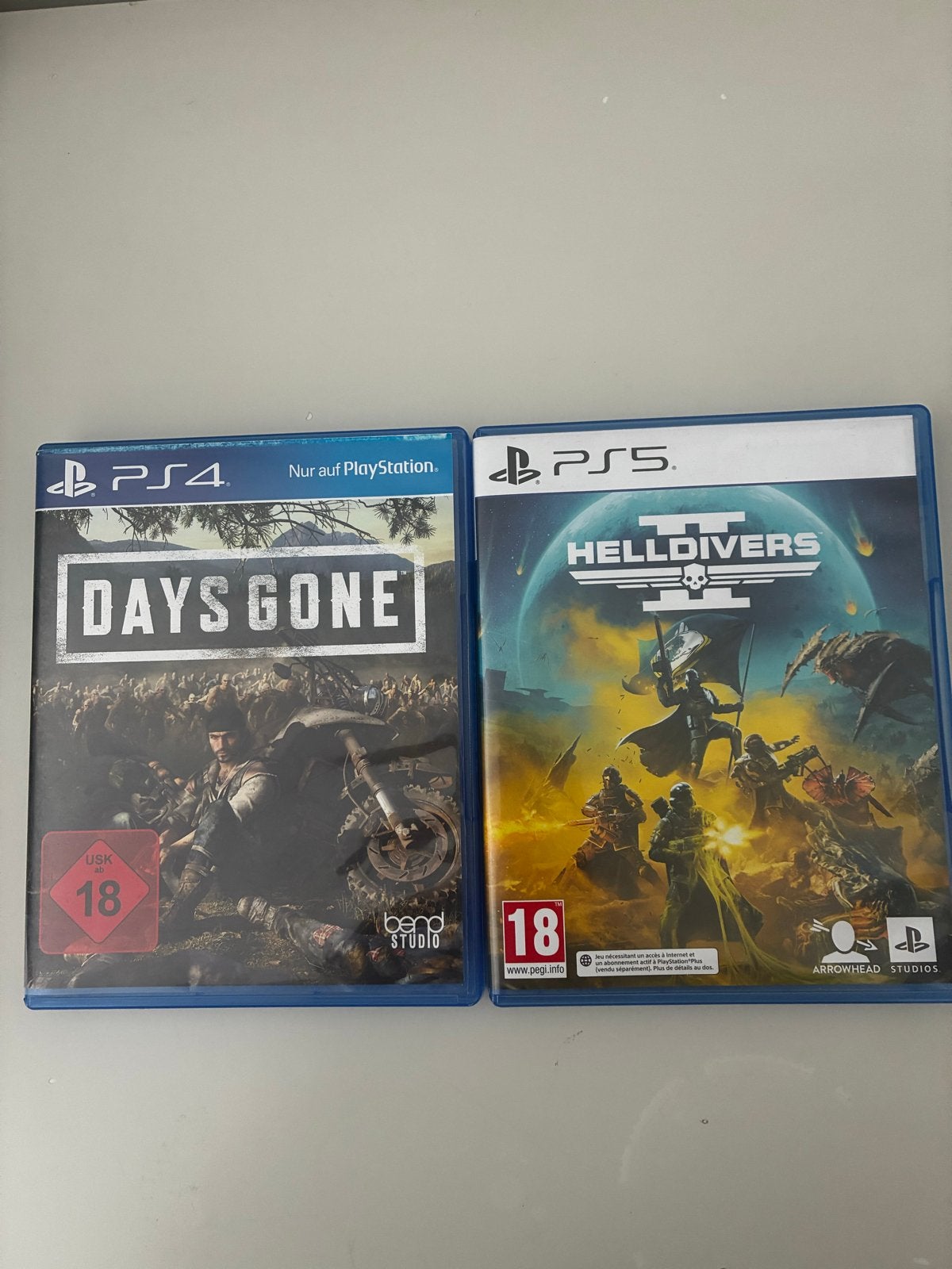 Days Gone (PS4) en Helldivers 2 (PS5) - Zo goed als nieuw, Avontuur en Actie, Online, Vanaf 18 jaar, Ophalen of Verzenden