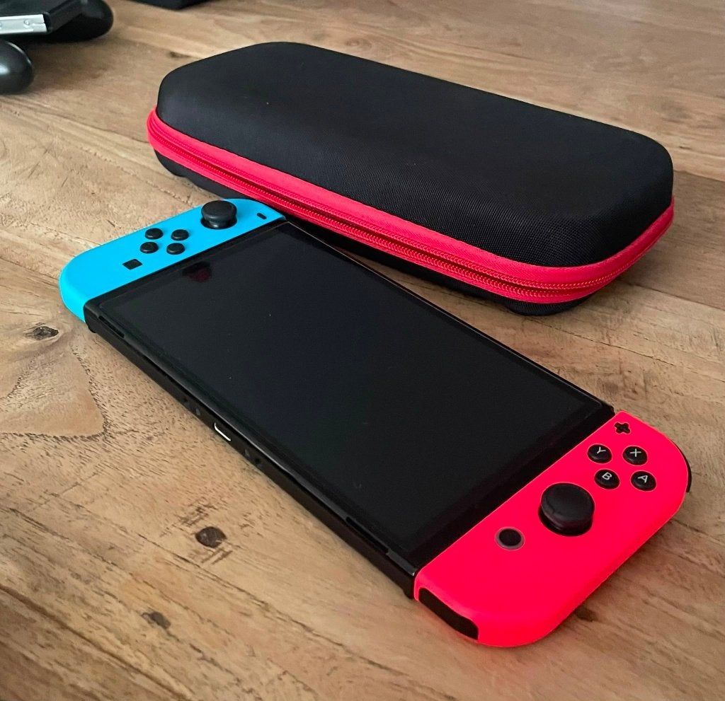Nintendo Switch OLED | rood/blauw, Ophalen of Verzenden, Zo goed als nieuw, Met 1 controller, Switch OLED