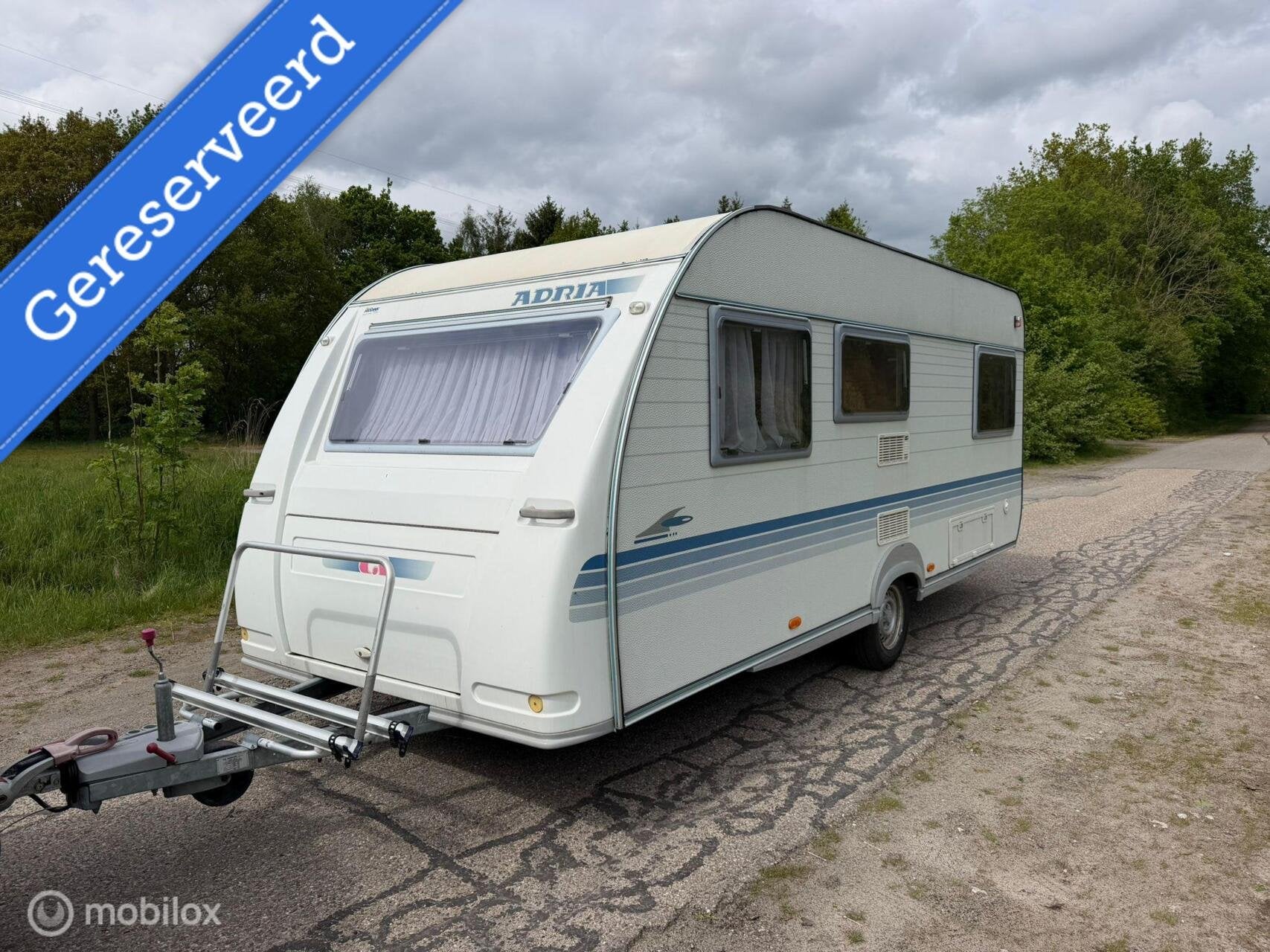 Adria 512 up luifel inruil mogelijk, Caravans en Kamperen, Vast bed, Rondzit, 7 tot 8 meter, Bedrijf