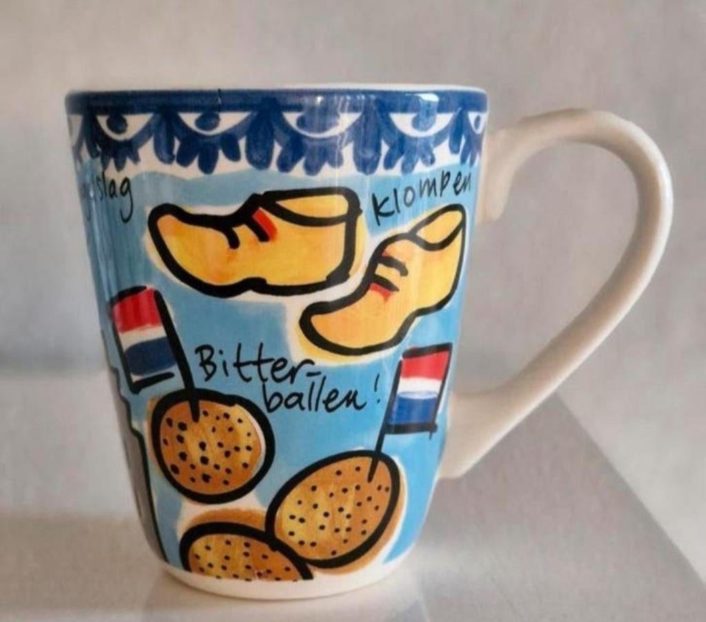 Beker Blond Amsterdam Learning Dutch while you're drinking, Huis en Inrichting, Keuken | Servies, Zo goed als nieuw, Kop(pen) en/of Schotel(s)