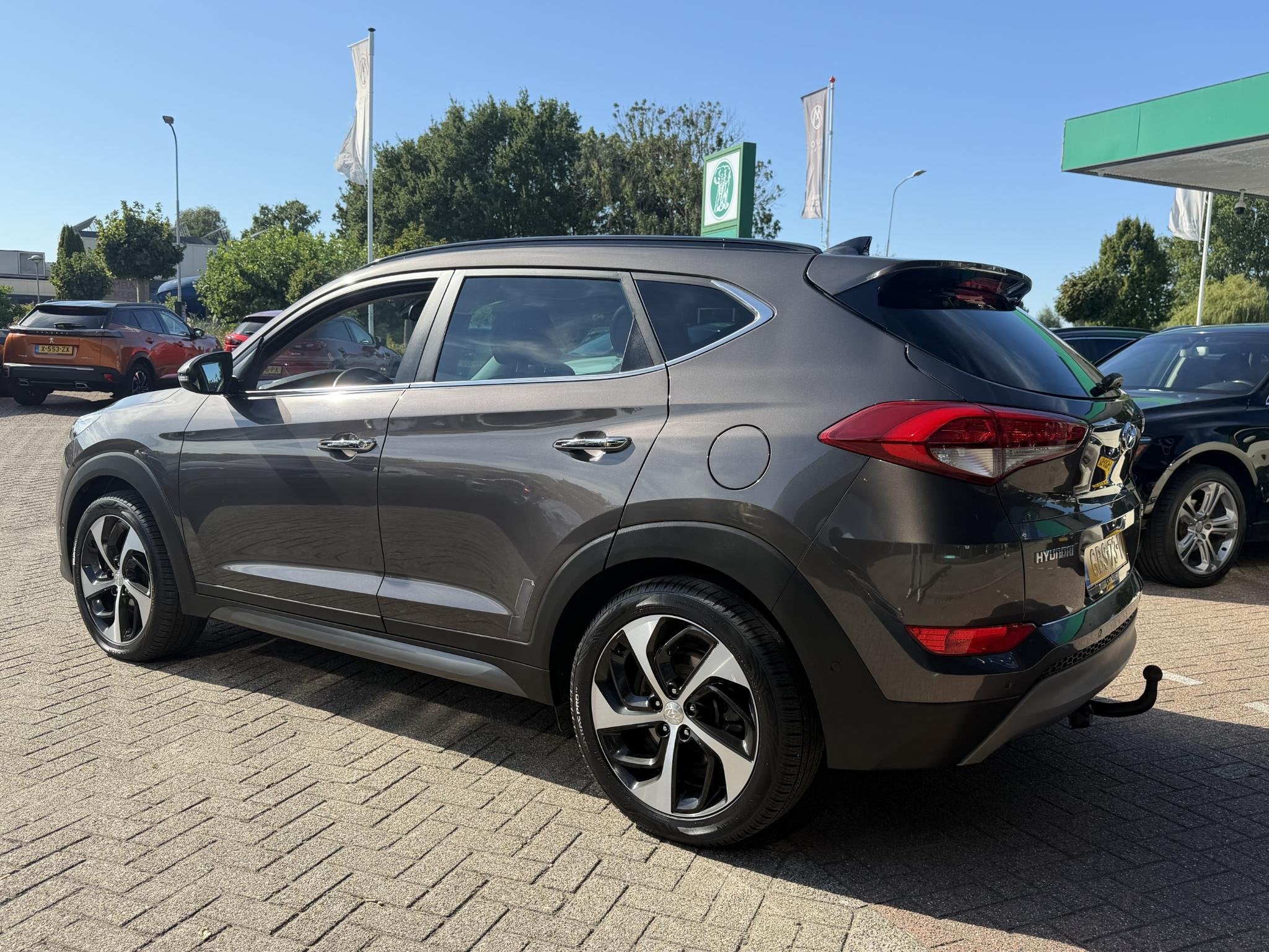 Hyundai Tucson 1.6 T-GDi Premium 4WD LEDER | KEYLESS ENTRY/G, Auto's, Gebruikt, 4 cilinders, Bruin, 1600 kg