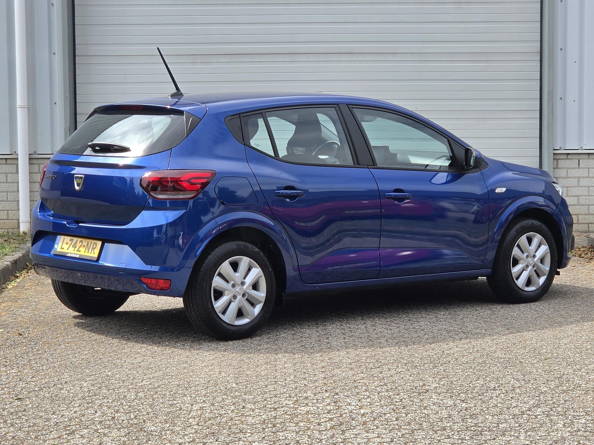 Dacia Sandero 1.0 Comfort / Dealer Onderhouden / 1e Eigenaar, Auto's, Stof, Gebruikt, Euro 6, Blauw