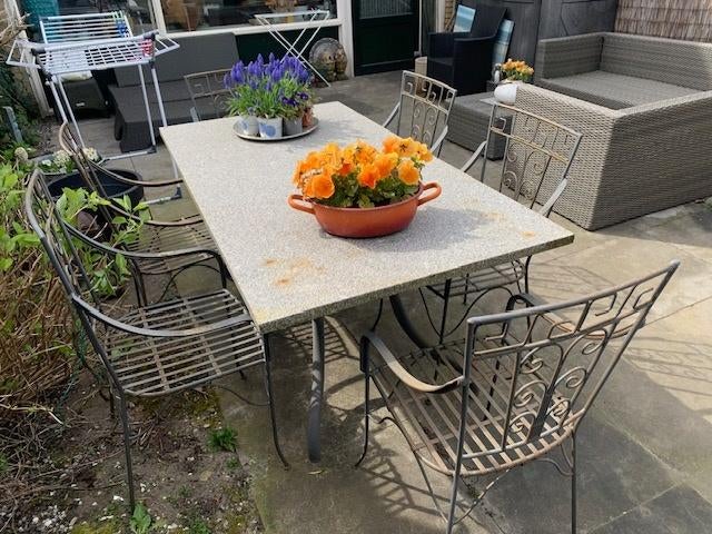 Granieten brocante tuintafel met 6 ijzeren stoelen, Ophalen, Gebruikt, Rechthoekig, Overige materialen