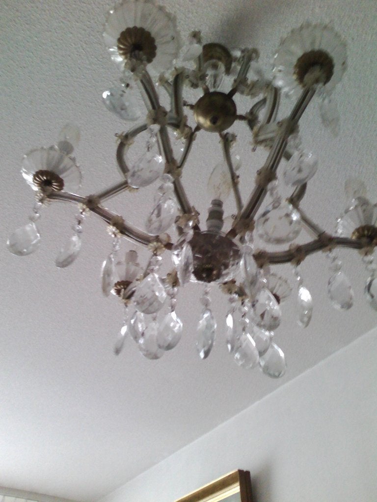 Oude bleikristallen kroonluchter 9 lichtpunten waarvan 3 bi, Ophalen