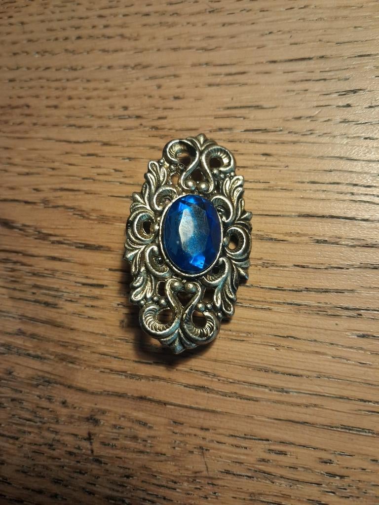 Broche met blauwe steen, Ophalen of Verzenden